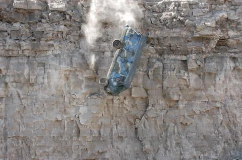 Van falling off cliff 02 Stock Photos