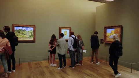 Van Gogh various paintings inside a gallery in the Orsay museum with Stock Footage 161945307