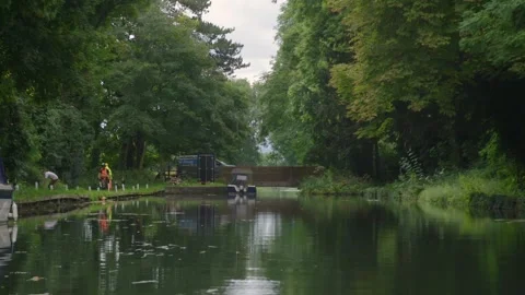 Van going over canal bridge Stock Footage 163274985