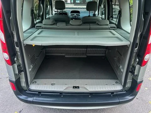 Van has a large cargo space with flexible seating that is folded down. Ideal  Stock Photos