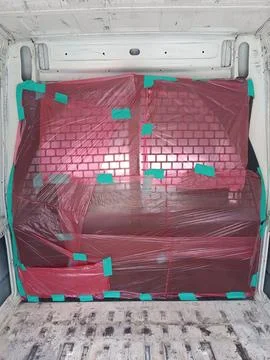 Van interior covered in plastic Stock Photos