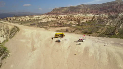 Van in the middle of the mountains of Cappadocia Stock Footage 254703214