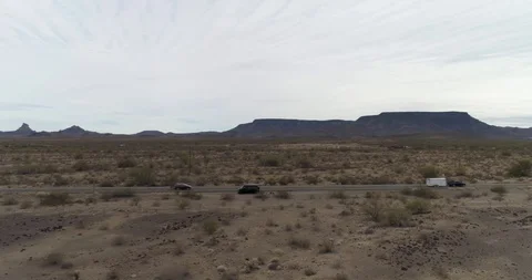 Van parked on the side of a road in deserted landscape Arizona drone aerial 4K Stock Footage 111310357