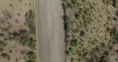 Van passes through a car on the road. Patagonia, Argentina. 스톡 동영상 71352278