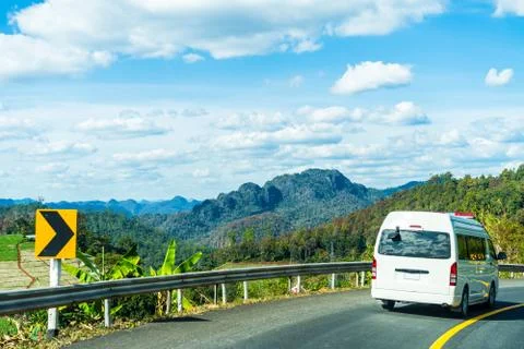 Van was running on the hill. Stock Photos
