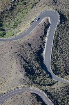 Van on a winding road. Stock Photos
