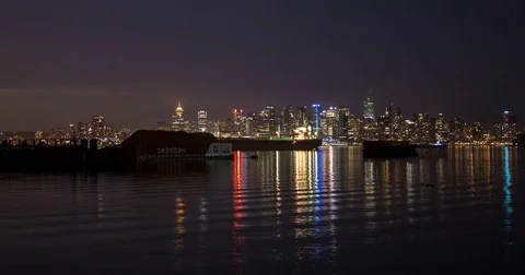 Vancouver, BC, Canada - harbor and illuminated city - Timelapse zoom out Stock Footage 75285017