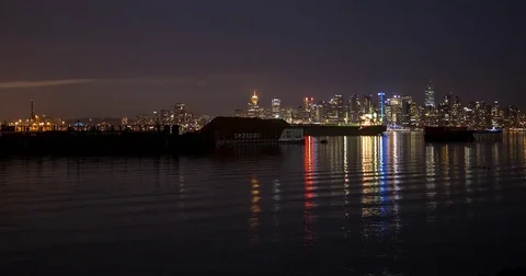 Vancouver, BC, Canada - harbor and illuminated city - Timelapse pan left Stock Footage 75285059