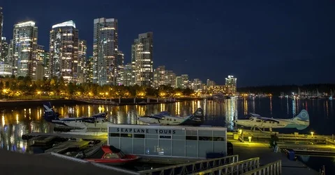 Vancouver, BC, Canada - seaplane flight pier and coastline - Timelapse zoom out Stock Footage 75284804