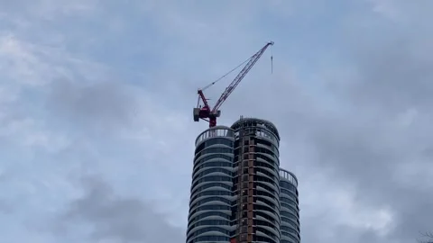 Vancouver building with construction crane cloudy day Stock Footage 282326453