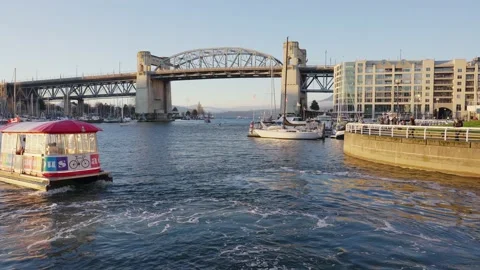 VANCOUVER - DEC 2020: Aquabus prepares to leave dock in Vancouver, BC, Canada. Stock Footage 145885352