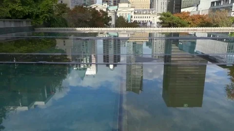 Vancouver reflected in big puddle Stock-Footage 69237426