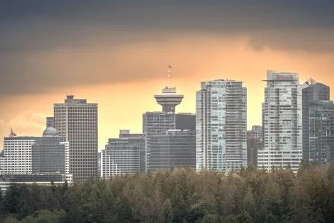 Vancouver skyline under a dramatic sunset Stock Photos