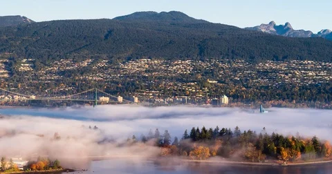 Vancouver Stanley Park Morning Fog over Lions Gate Bridge Stock Footage