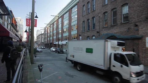 Vancouver yaletown brick alley with delivery.truck Stock Footage