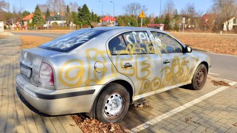 Vandalized silver car Stock Photos