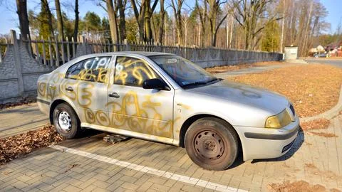 Vandalized silver car Stock Photos