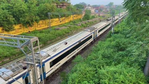 Vande Bharat Express Passing Through Green Corridor Stock Footage 319818624
