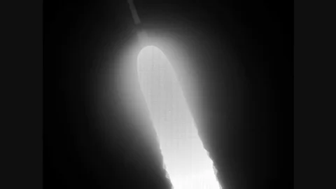 Vandenberg Air Force Base launch Delta II Rocket at night Stock Footage 82784954