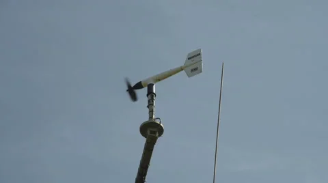 A Vane Anemometer Wind meter spinning and moving in quick winds Stock Footage 53506932