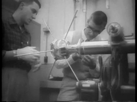 The Vanguard TV3 rocket falls and explodes into flames, on a launch pad, at Cape Stock Footage 74976734