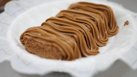 Vanilla And Cinnamon Cake With Dulce de Leche Filling and Dressing Stock Footage 128821299