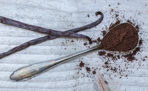 Vanilla and vanilla beans on a spoon macro Stock Photos