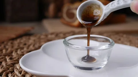 Vanilla Bean Paste with vanilla pods Stock Footage 304362549