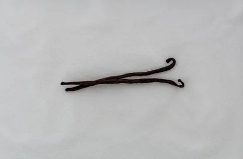 Vanilla bean with sugar as background Stock Photos