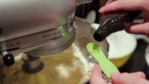 Vanilla Being Poured into Mixer Stock Footage 142153584