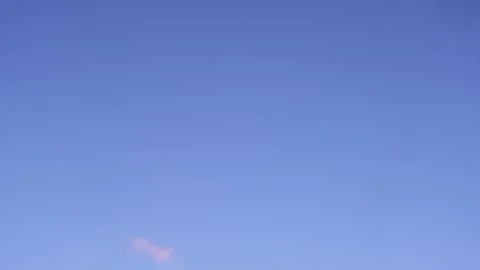 Vanilla Blue sky pink clouds. Puffy fluffy white clouds. Cumulus cloud Stock Footage 235423846