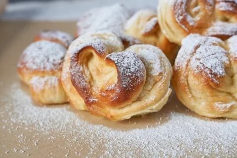 Vanilla buns with icing sugar. 스톡 사진