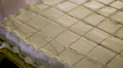 Vanilla Cake Cut In Squares Stock Footage 61350195