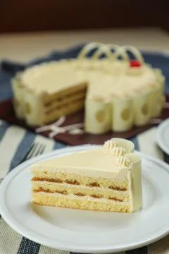 Vanilla Cake slice include cream, sugar, red berry served in plate isolated.. Foto stock