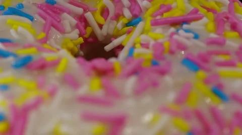 Vanilla Dipped Sprinkled Donut Stock Footage 42710584