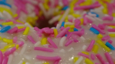 Vanilla Dipped Sprinkled Donut Stock Footage 42710601