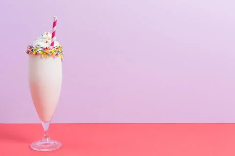 Vanilla milkshake on pinks Stock Photos