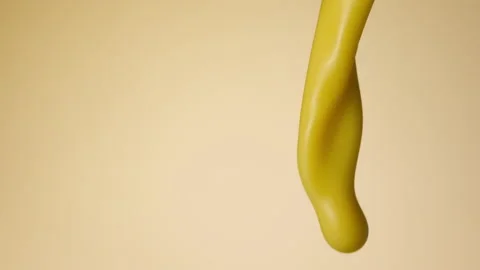 Vanilla milkshake pouring over flat background Stock Footage 149062900