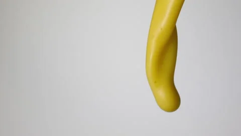 Vanilla milkshake pouring over flat background Stock Footage 149063511