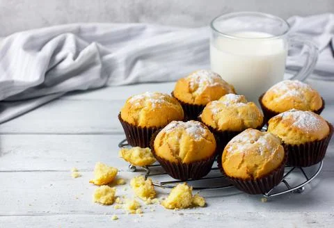 Vanilla muffins on a cooling rack. Stock Photos