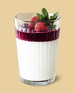 Vanilla panna cotta with raspberry served in a glass Stock Photos