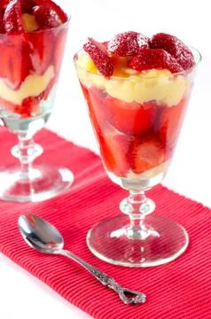 Vanilla pudding and strawberries Stock Photos