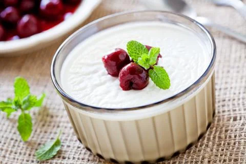Vanilla Pudding With Cherries Stock Photos