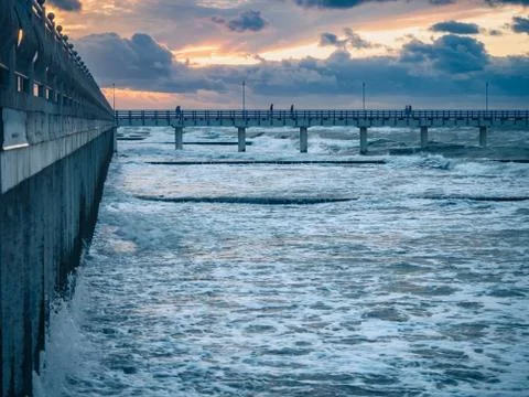 Vanilla sky and storm on the Baltic Sea at sunset, Zelenogradsk city Stock Photos