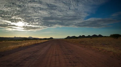 Vanishing point from middle of road, car passes. UHD 4K Stock Footage 45342353