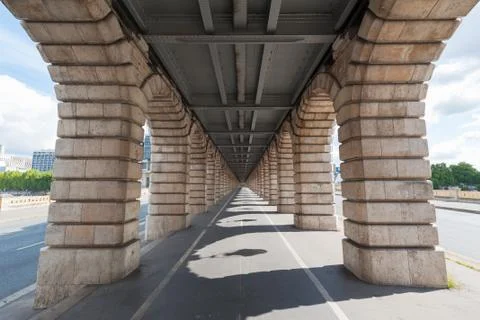 Vanishing point view from under Bercy bridge in Paris Stock Photos