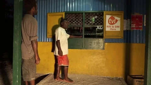 Vanuatu shop at night Stock Footage 76504221