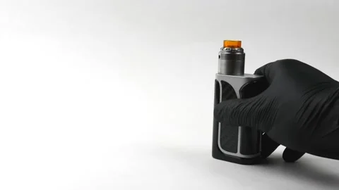 Vape device or electronic cigarette, scissors and new cotton wool 스톡 동영상 131852632