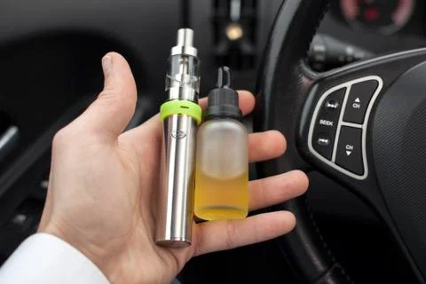 Vape in the hand. Stock Photos