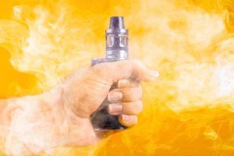 Vape in hand Stock Photos